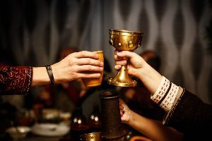 People toasting with renaissance cups