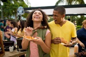 Couple enjoying the Seven Seas Food Festival at SeaWorld Orlando