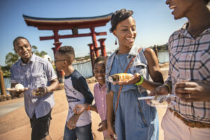 Family visiting EPCOT's World Pavilion, the perfect destination for life-changing travel